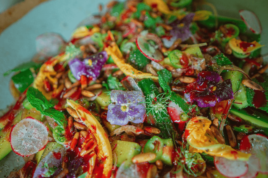 Fresh salad drizzled with The Sauce